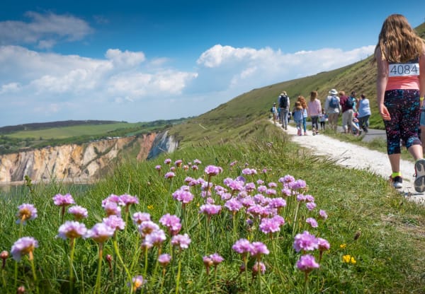 A group of people walking in the Springtime on the Isle of Wight