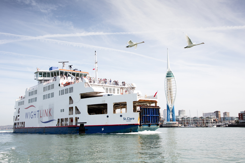 Two geese fly past Wightlink's St Clare ferry