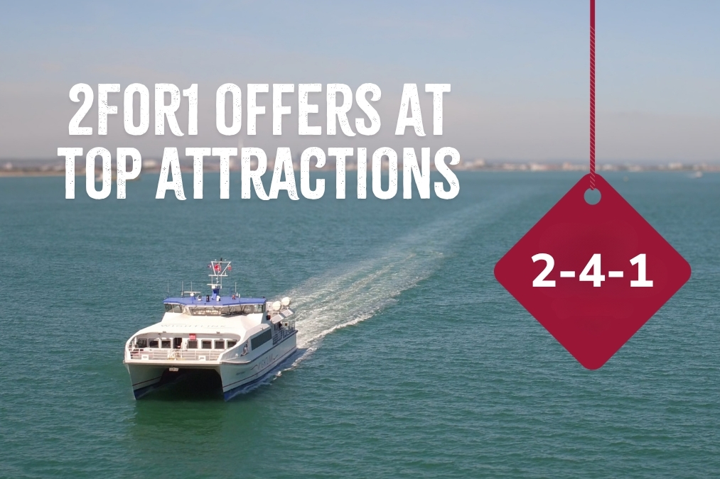 Passenger ferry at sea promoting 2-for-1 admission offers at top attractions.