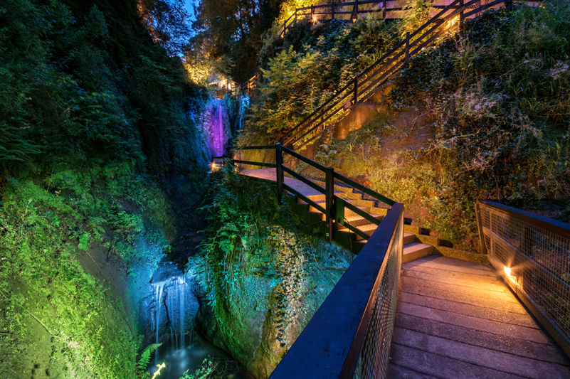 An illuminated bridge and gorge at Shanklin Chine