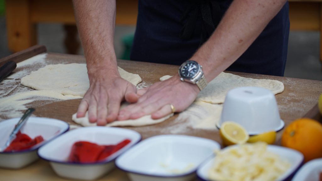 James Tanner making pizza dough with Isle of Wight ingredients
