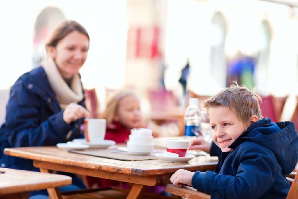 Family dining outdoors