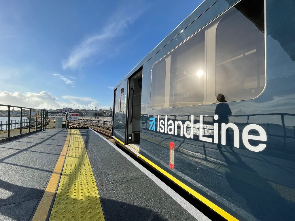 A modernised Island Line train pulled in at a station on Ryde Pier