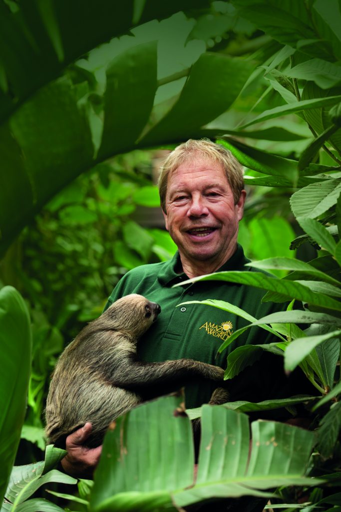 Islander Derek Curtis at Amazon World Zoo Park holding a sloth on the Isle of Wight