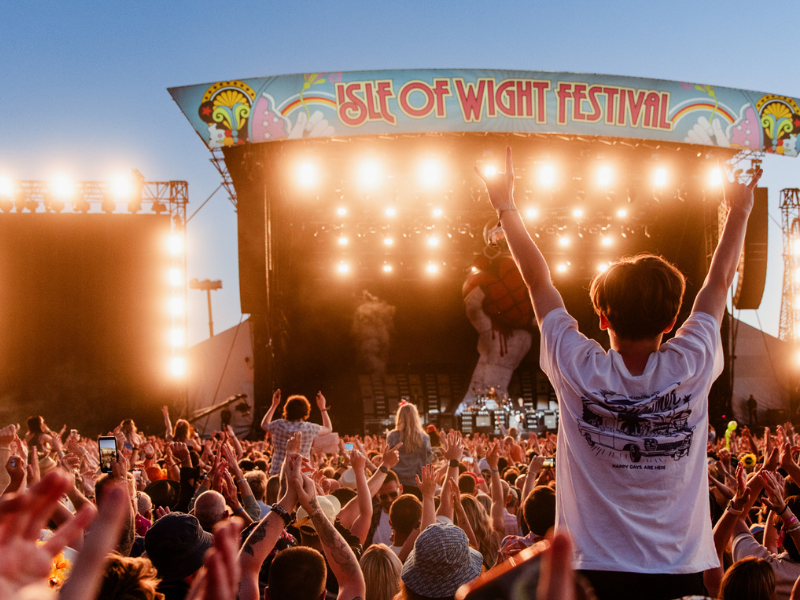 A large crowd of people at a festival