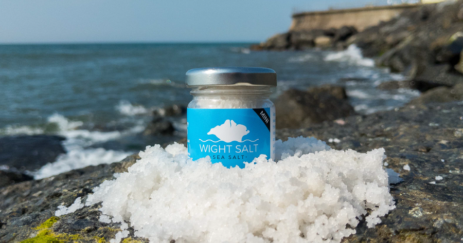 A pot of Wight Salt on a beach