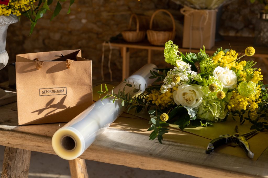 A table with floristry equipment and flowers at Tapnell Farm, Isle of Wight