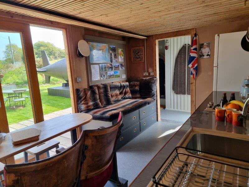 Interior lounge of HMS Bond's Dock, Windmill Campersite, Isle of Wight