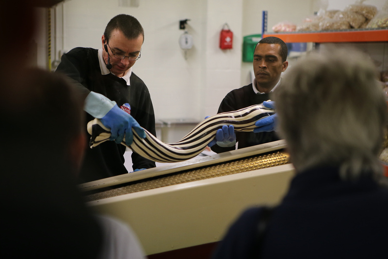 Two men making humbug sweets at the Isle of Wight Sweet Manufactory