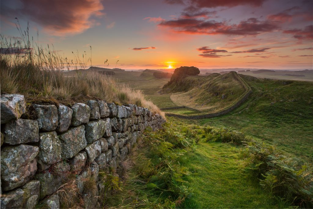 View along a long stony wall - Hadrian's Wall - at sunset. Credit VisitBritainThomas Heaton.jpg