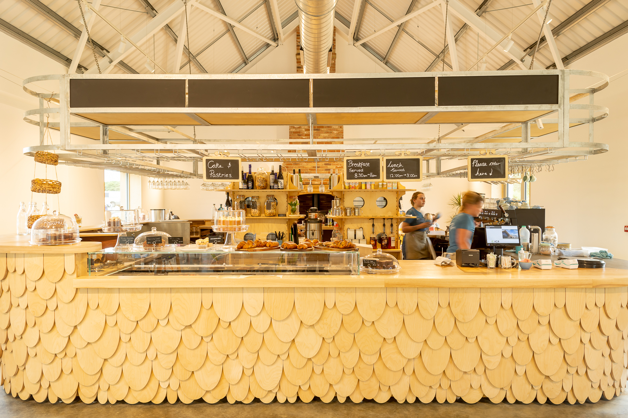Harvey Browns café counter serving freshly baked cakes, pastries, breakfast and lunch dishes.