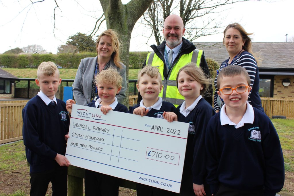 Pupils and teachers at Wroxall Primary School Isle of Wight receiving a grant cheque from Wightlink