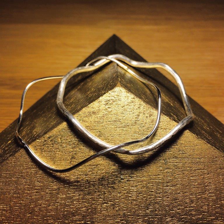 Silver bracelets made by Be Charlo