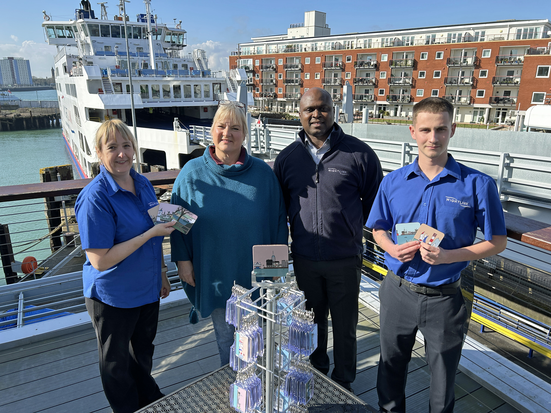 Wightlink stewards Mel and Charlie with (centre) Lizzie Cornelius and Wightlink’s Eastern Retail Operations Manager Jermaine Knight at the Camber Café in Portsmouth