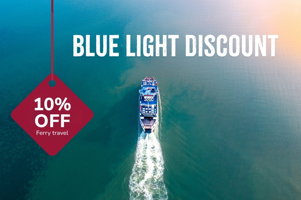 Aerial view of a ferry travelling across open water. Promotional text reads: "Blue Light Discount – 10% off ferry travel."
