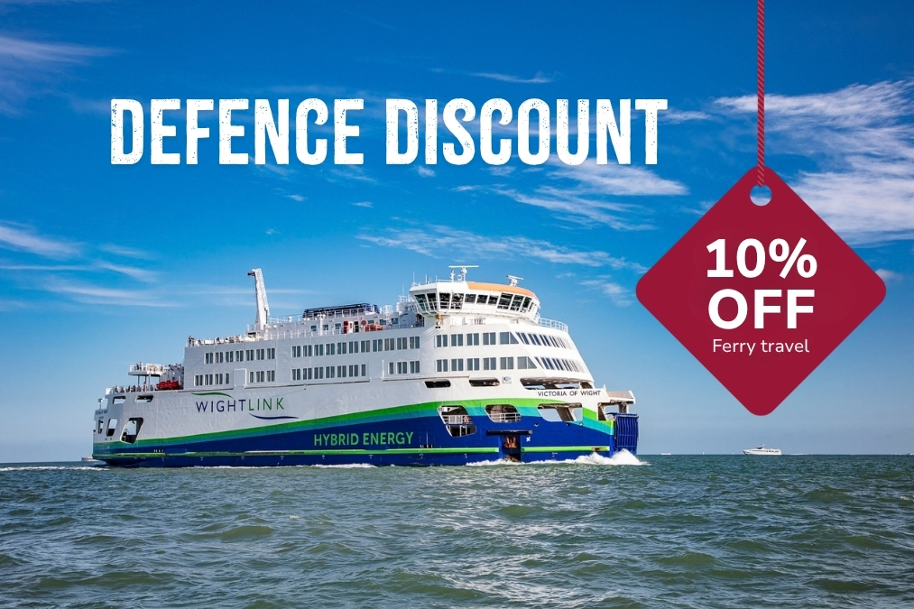 Wightlink ferry sailing at sea beneath a blue sky. Promotional text reads: "Defence Discount – 10% off ferry travel."