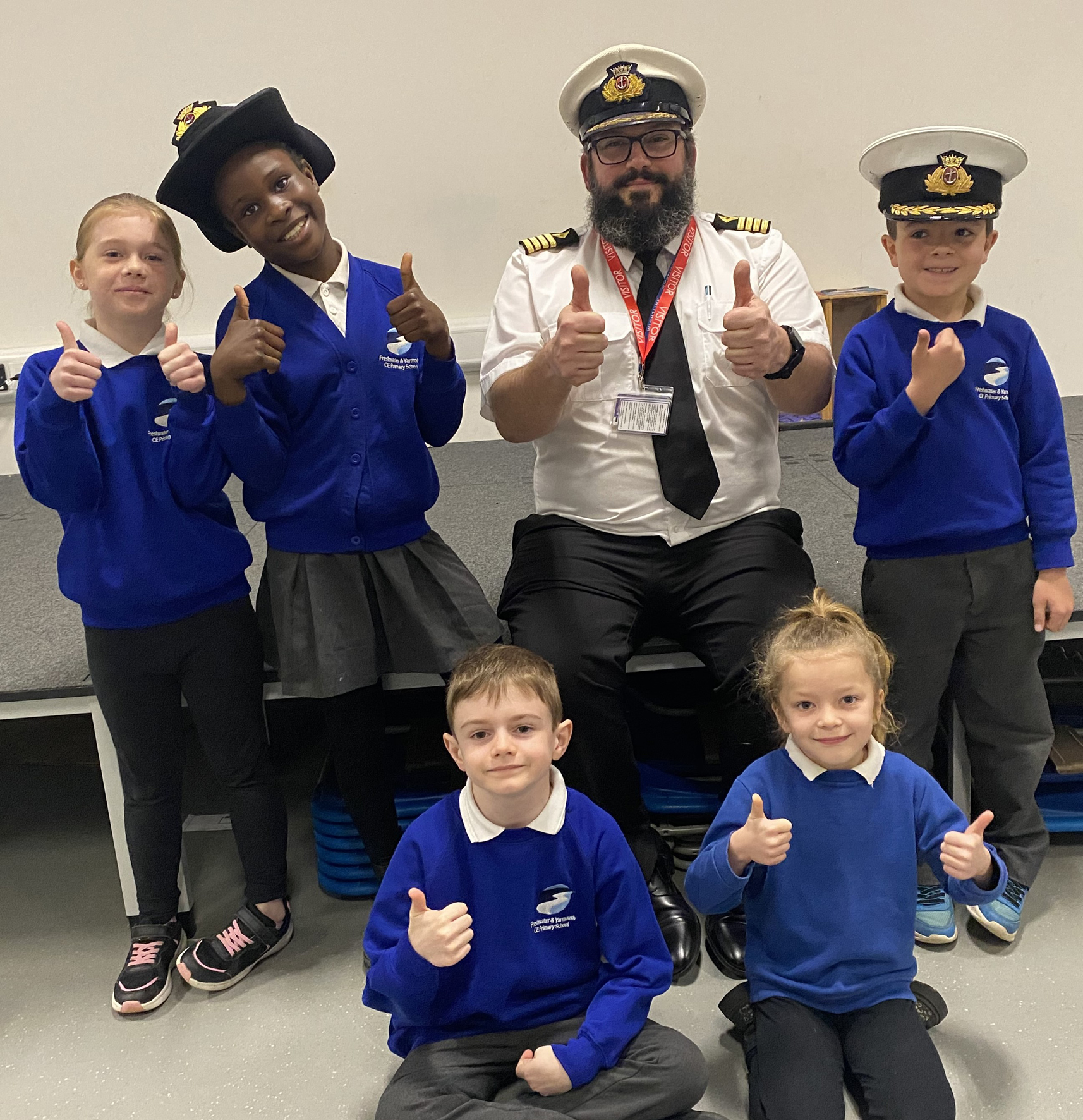 Captain Tom Vincent with some of the youngsters at the Federation of Church Schools of Shalfleet, Freshwater and Yarmouth