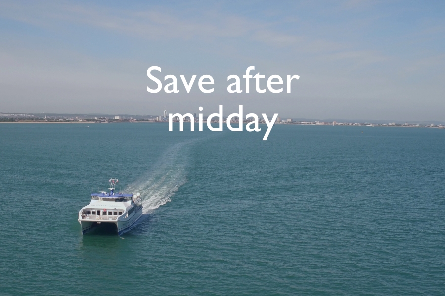 A Wightlink FastCat travelling across calm blue water with a coastline in the distance, overlaid with the text “Save after midday”.