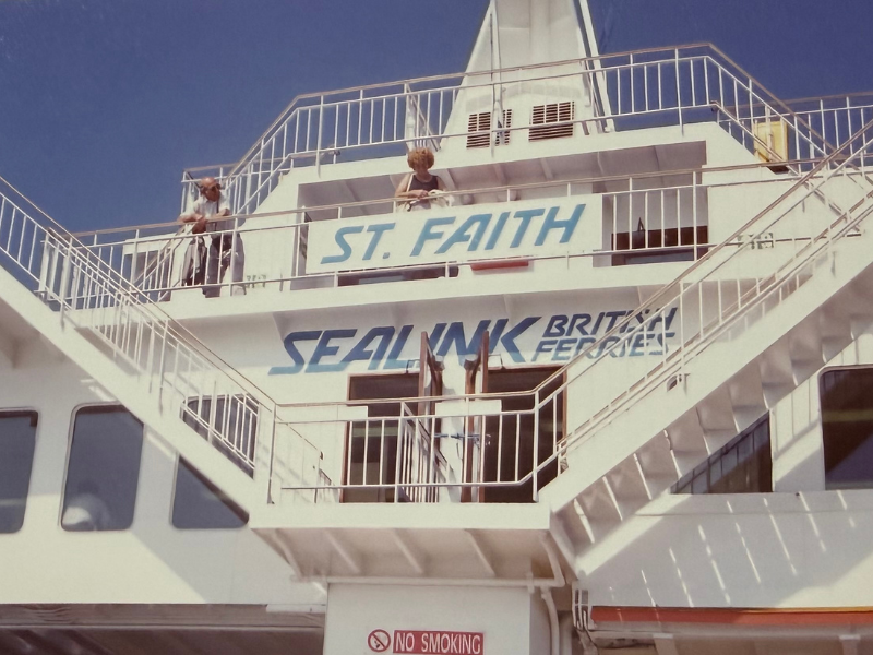 A front view of a white ferry with the words 'Sealink' and 'St Faith' on the front. People are standing on the steps. Courtesy Brian Smith
