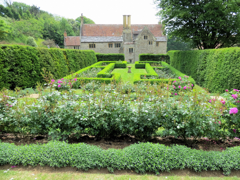 A view of Mottistone Manor from the gardens. An ancient manor and celebrity wedding reception venue