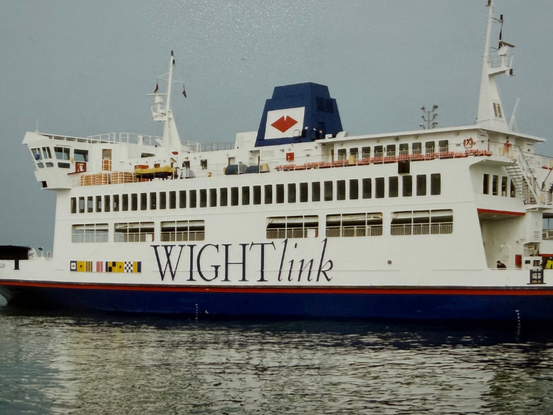 An Isle of Wight ferry called St Helen, with the Wightlink livery is on the water