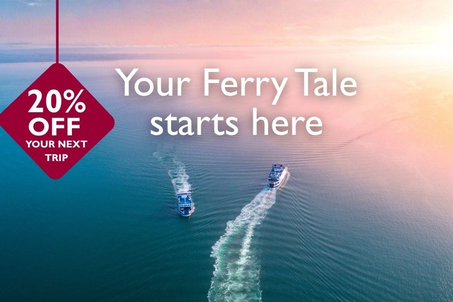 Aerial view of two Wightlink ferries crossing the Solent at sunset, with a 20% off your next trip offer and the message "Your Ferry Tale starts here".