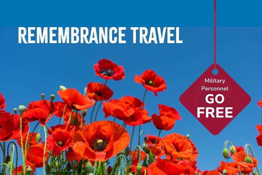 Field of bright red poppies against a clear blue sky, promoting Remembrance travel. Text reads “REMEMBRANCE TRAVEL”, with a hanging tag stating “Military Personnel GO FREE”.