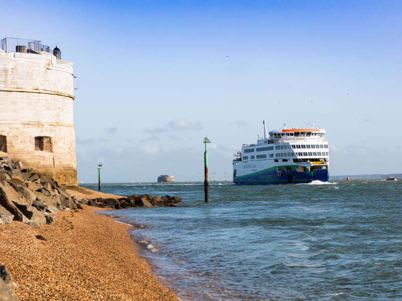 An Isle of Wight ferry (Victoria of Wight) approaches Portsmouth alongside the Round Tower